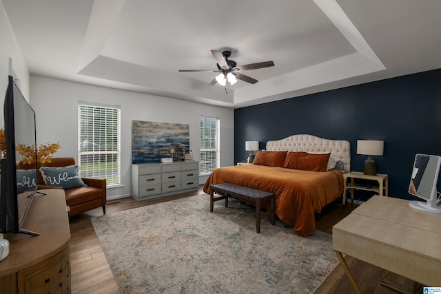5883 William O Ln, Gardendale, AL 35071 - bedroom with a raised ceiling, wood finished floors, and ceiling fan