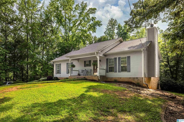 5883 William O Ln, Gardendale, AL 35071 - single story home with a porch, a chimney, a front lawn, and roof with shingles