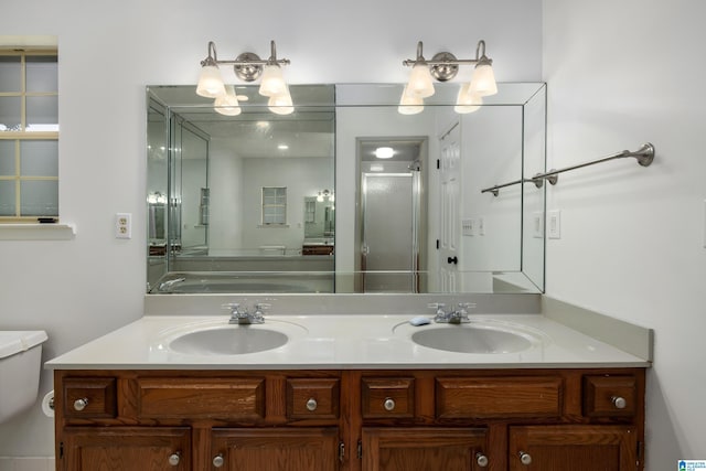 5883 William O Ln, Gardendale, AL 35071 - full bathroom with double vanity, toilet, and a stall shower
