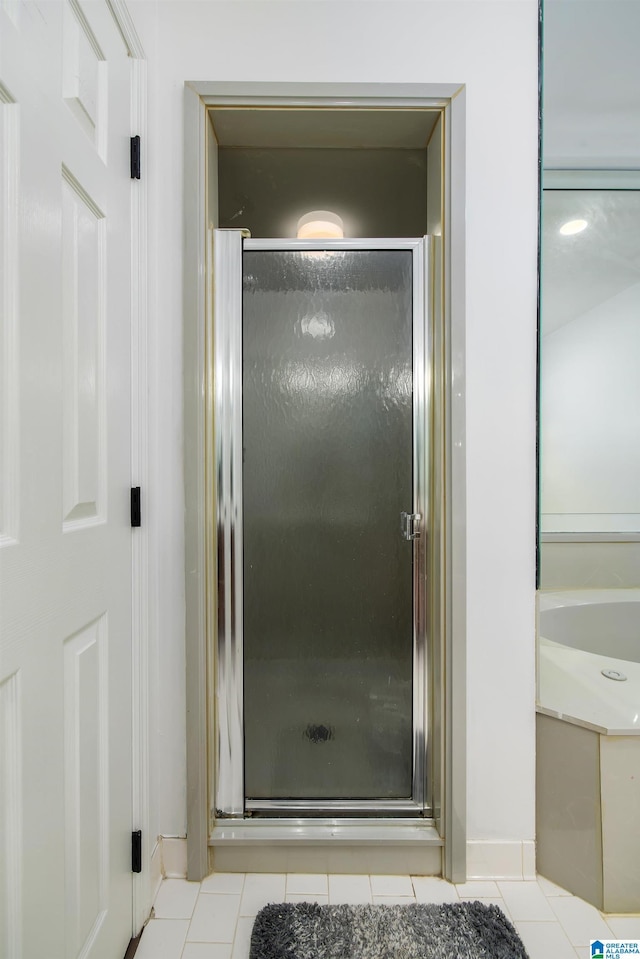 5883 William O Ln, Gardendale, AL 35071 - bathroom featuring tile patterned floors and a stall shower