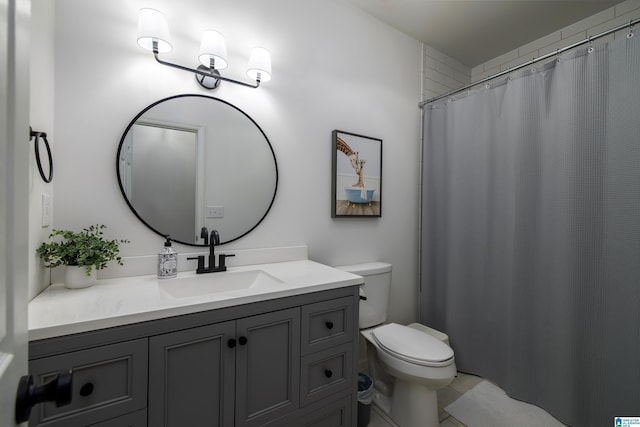 5883 William O Ln, Gardendale, AL 35071 - full bathroom with toilet, vanity, and a shower with shower curtain
