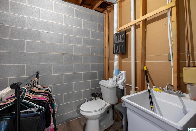5883 William O Ln, Gardendale, AL 35071 - half bath featuring toilet and concrete block wall