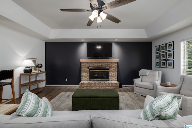 5883 William O Ln, Gardendale, AL 35071 - living room with a tray ceiling, a ceiling fan, wood finished floors, and recessed lighting