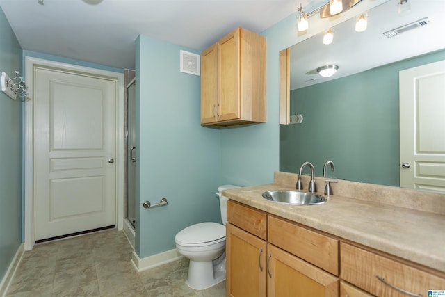401 20th St S Unit 322, Birmingham, AL 35233 - full bathroom featuring vanity, baseboards, toilet, and a shower stall