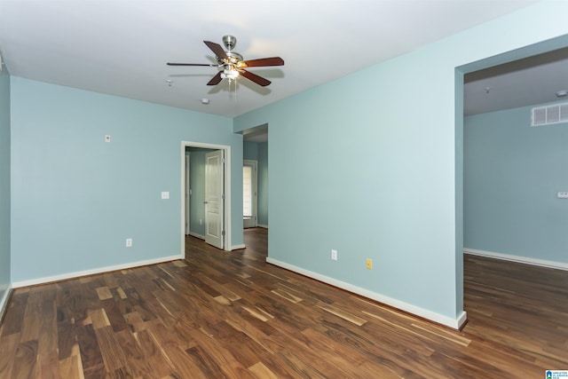 401 20th St S Unit 322, Birmingham, AL 35233 - unfurnished room with a ceiling fan, baseboards, dark wood-type flooring, and a smoke detector