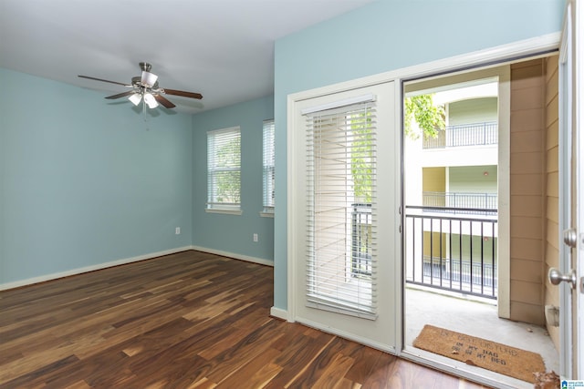 401 20th St S Unit 322, Birmingham, AL 35233 - doorway to outside featuring ceiling fan, wood finished floors, and baseboards
