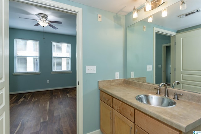 401 20th St S Unit 322, Birmingham, AL 35233 - bathroom with ceiling fan, vanity, hardwood / wood-style flooring, and baseboards