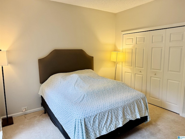 2004 Waterford Pl Unit 2004, Hoover, AL 35244 - bedroom featuring light colored carpet and a closet