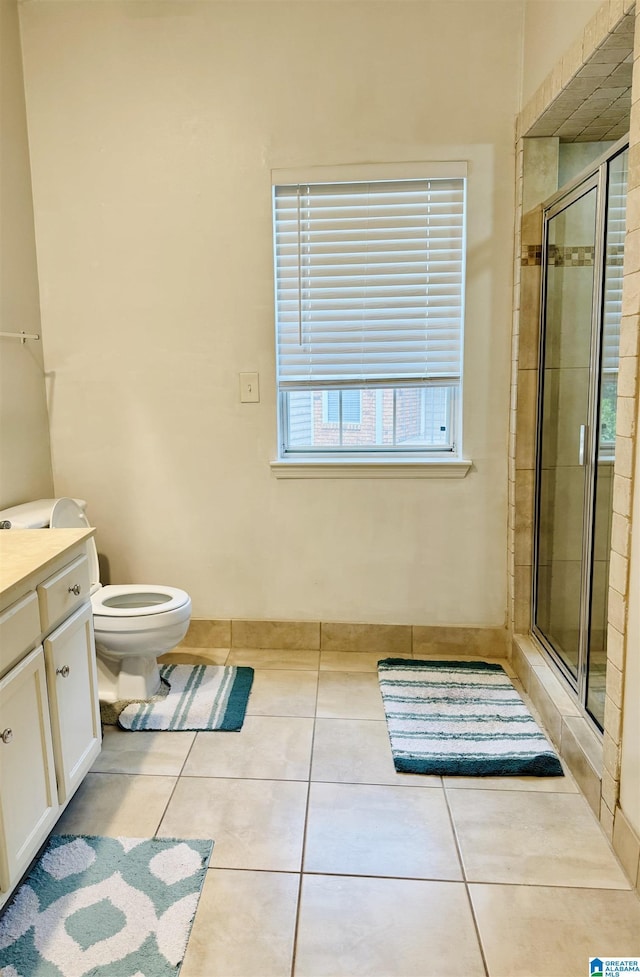 2004 Waterford Pl Unit 2004, Hoover, AL 35244 - bathroom with vanity, tile patterned flooring, and a shower stall