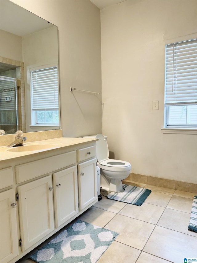 2004 Waterford Pl Unit 2004, Hoover, AL 35244 - full bathroom with tile patterned flooring, vanity, a stall shower, and plenty of natural light