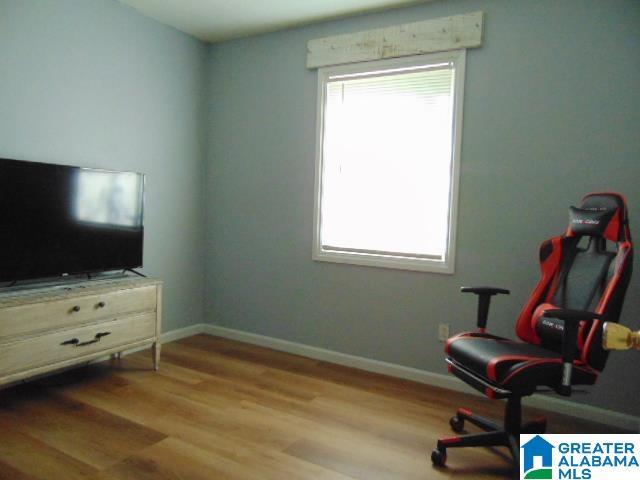 101 Randall Cir, Clanton, AL 35045 - living area with wood finished floors