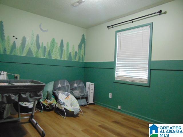 101 Randall Cir, Clanton, AL 35045 - bedroom featuring wood finished floors and baseboards