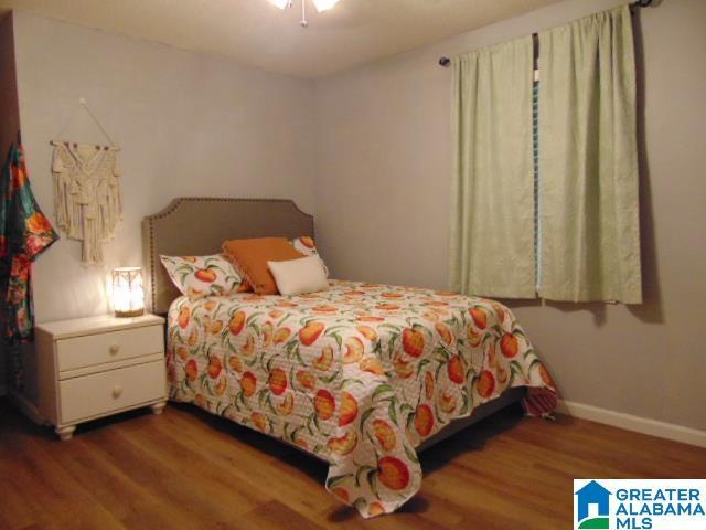 101 Randall Cir, Clanton, AL 35045 - bedroom featuring wood finished floors and baseboards