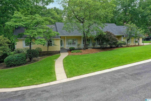 2940 Coatbridge Ln, Birmingham, AL 35242 - view of front of house with a porch, a front yard, and roof with shingles