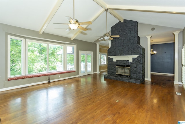 2940 Coatbridge Ln, Birmingham, AL 35242 - unfurnished living room featuring a ceiling fan, baseboards, a fireplace, wood finished floors, and a chandelier