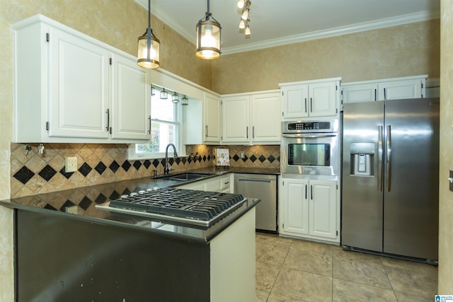 2940 Coatbridge Ln, Birmingham, AL 35242 - kitchen featuring appliances with stainless steel finishes, a sink, dark countertops, white cabinets, and crown molding