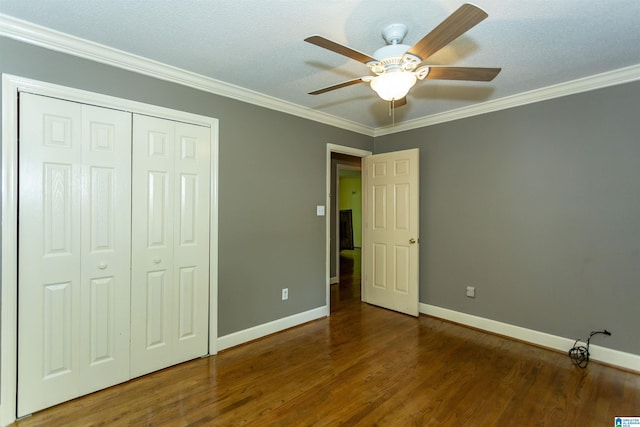 2940 Coatbridge Ln, Birmingham, AL 35242 - unfurnished bedroom with wood finished floors, baseboards, crown molding, a closet, and a ceiling fan
