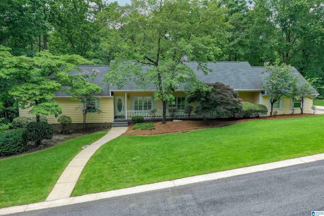 2940 Coatbridge Ln, Birmingham, AL 35242 - ranch-style home featuring roof with shingles, covered porch, and a front yard