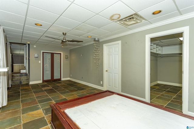 2940 Coatbridge Ln, Birmingham, AL 35242 - unfurnished bedroom with baseboards, crown molding, a closet, and ceiling fan