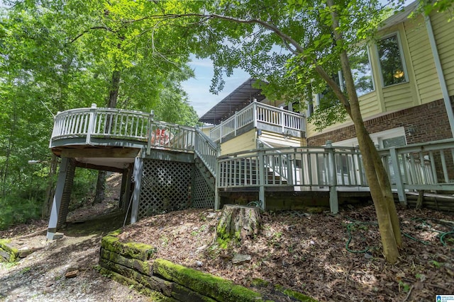 2940 Coatbridge Ln, Birmingham, AL 35242 - back of house with brick siding, a wooden deck, and stairs