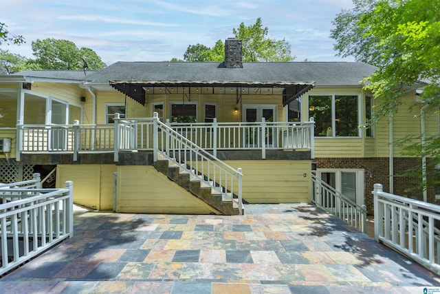 2940 Coatbridge Ln, Birmingham, AL 35242 - back of house featuring stairs, a chimney, an attached garage, and a shingled roof