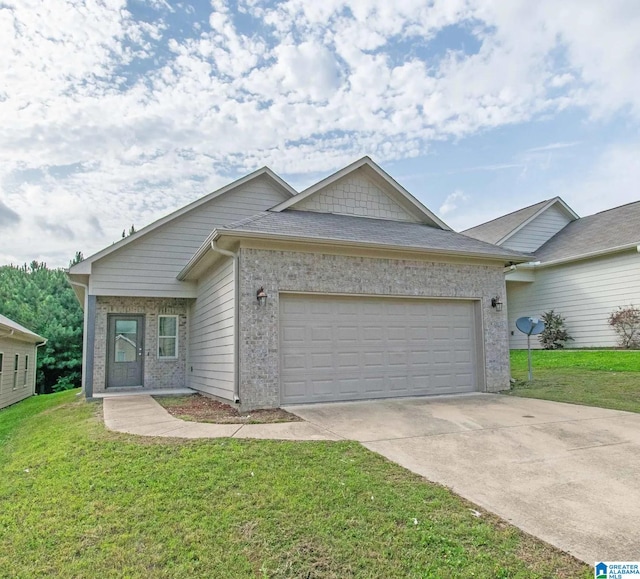 915 Maple Trce, Odenville, AL 35120 - single story home featuring an attached garage, concrete driveway, a front yard, and brick siding