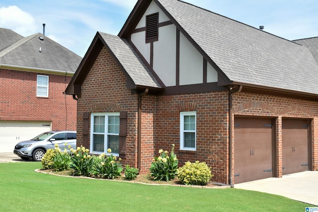 1035 Princeton Park, Montevallo, AL 35115 - view of property exterior with brick siding, driveway, and roof with shingles