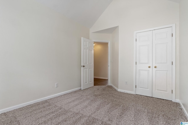 132 Summerchase Pkwy, Calera, AL 35040 - unfurnished bedroom with carpet floors, baseboards, high vaulted ceiling, and a closet