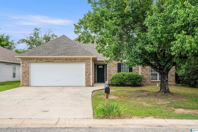 132 Summerchase Pkwy, Calera, AL 35040 - view of front of property with roof with shingles, brick siding, an attached garage, and concrete driveway