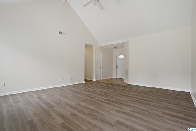 132 Summerchase Pkwy, Calera, AL 35040 - spare room with high vaulted ceiling, baseboards, ceiling fan, and wood finished floors