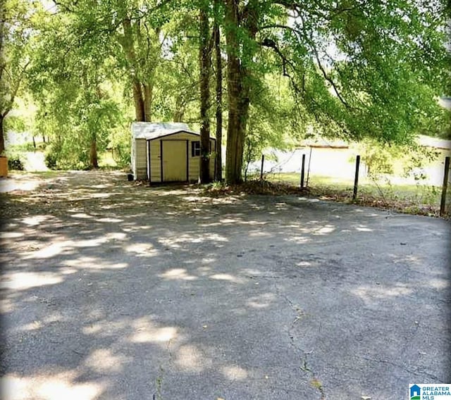 145 Maine Dr, Cropwell, AL 35054 - view of yard with a storage unit