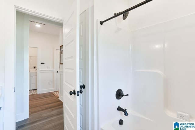 157 Shiloh Creek Dr, Calera, AL 35040 - full bathroom with shower / tub combination, wood finished floors, and washer / clothes dryer