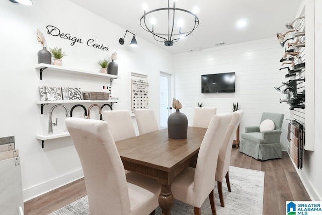 157 Shiloh Creek Dr, Calera, AL 35040 - dining room featuring a chandelier, wood finished floors, baseboards, a fireplace, and recessed lighting