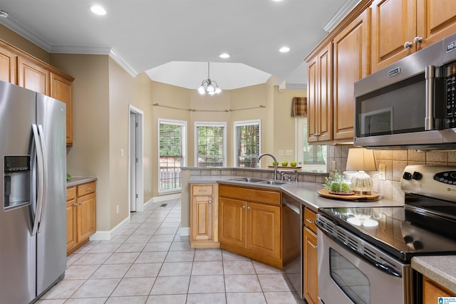 22582 Iron Masters Loop, Mccalla, AL 35111 - kitchen with stainless steel appliances, a sink, crown molding, a peninsula, and light tile patterned flooring