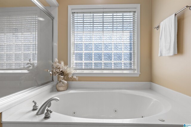 22582 Iron Masters Loop, Mccalla, AL 35111 - full bath featuring plenty of natural light and a jetted tub