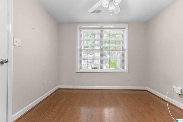 22582 Iron Masters Loop, Mccalla, AL 35111 - unfurnished room with wood finished floors, a ceiling fan, and baseboards