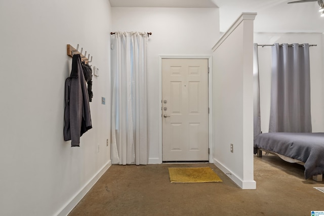 401 20th St S Unit 119, Birmingham, AL 35233 - foyer entrance featuring concrete flooring and baseboards