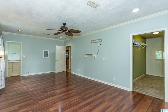 1647 Moncrief Rd, Gardendale, AL 35071 - unfurnished bedroom with wood finished floors, baseboards, recessed lighting, a spacious closet, and ornamental molding