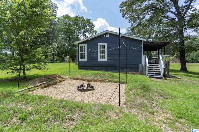 1647 Moncrief Rd, Gardendale, AL 35071 - view of home's exterior featuring a yard and stairs