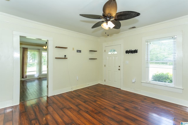 1647 Moncrief Rd, Gardendale, AL 35071 - entryway with crown molding, a ceiling fan, hardwood / wood-style flooring, and baseboards