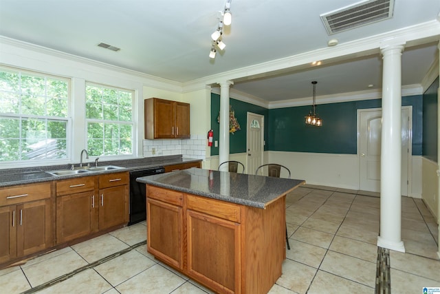 1647 Moncrief Rd, Gardendale, AL 35071 - kitchen with dishwasher, a sink, decorative columns, light tile patterned flooring, and ornamental molding