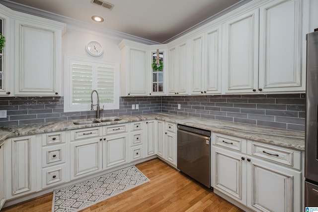 325 Driving Range Rd, Cropwell, AL 35054 - kitchen featuring stainless steel dishwasher, a sink, backsplash, light wood-style floors, and ornamental molding