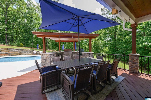 325 Driving Range Rd, Cropwell, AL 35054 - wooden deck with outdoor dining space, an outdoor pool, and view of scattered trees