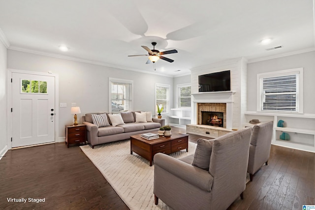 4304 Cahaba Bnd, Trussville, AL 35173 - living room featuring a ceiling fan, crown molding, dark wood finished floors, a brick fireplace, and recessed lighting