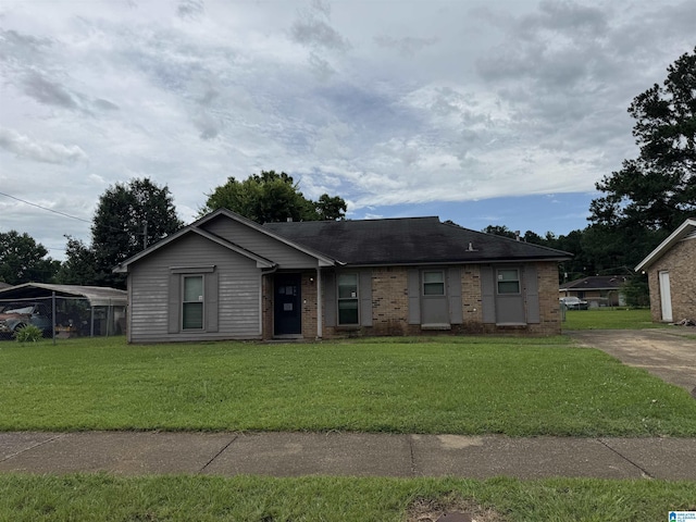 4513 Lonesome Pine Dr, Montgomery, AL 36108 - ranch-style house featuring a front yard and brick siding