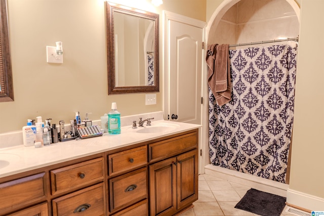 178 Jerry Marsh Rd, Locust Fork, AL 35097 - full bathroom featuring double vanity, tile patterned flooring, and a shower with curtain