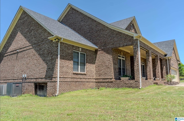 178 Jerry Marsh Rd, Locust Fork, AL 35097 - view of side of property featuring brick siding, a yard, and a garage