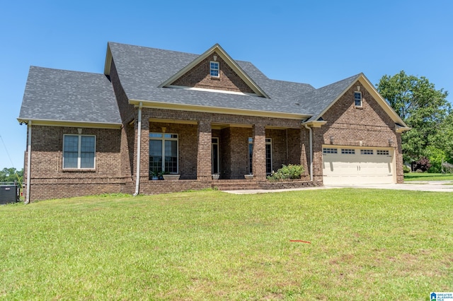 178 Jerry Marsh Rd, Locust Fork, AL 35097 - craftsman inspired home with brick siding, a garage, a front yard, driveway, and roof with shingles