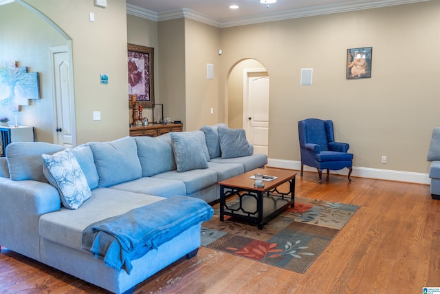 178 Jerry Marsh Rd, Locust Fork, AL 35097 - living area featuring arched walkways, baseboards, wood finished floors, recessed lighting, and crown molding