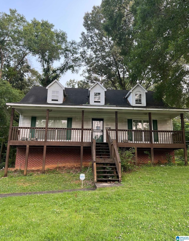 402 Memorial Dr, Bessemer, AL 35022 - view of front of house featuring covered porch, a front yard, and stairs